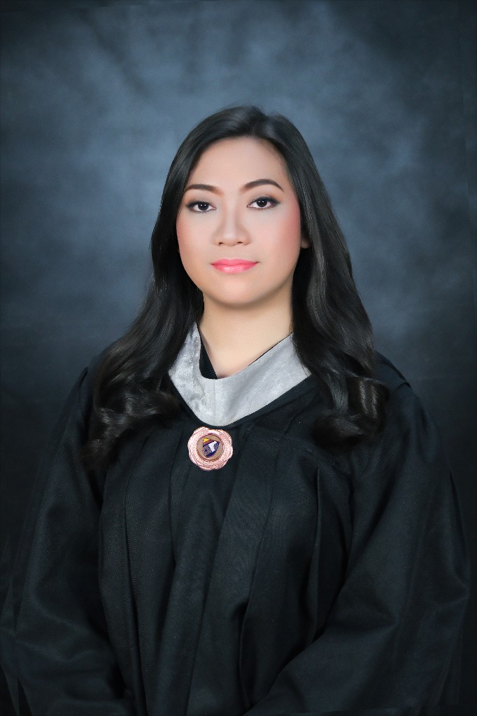 Hannah Grace B. Florano in graduation attire
